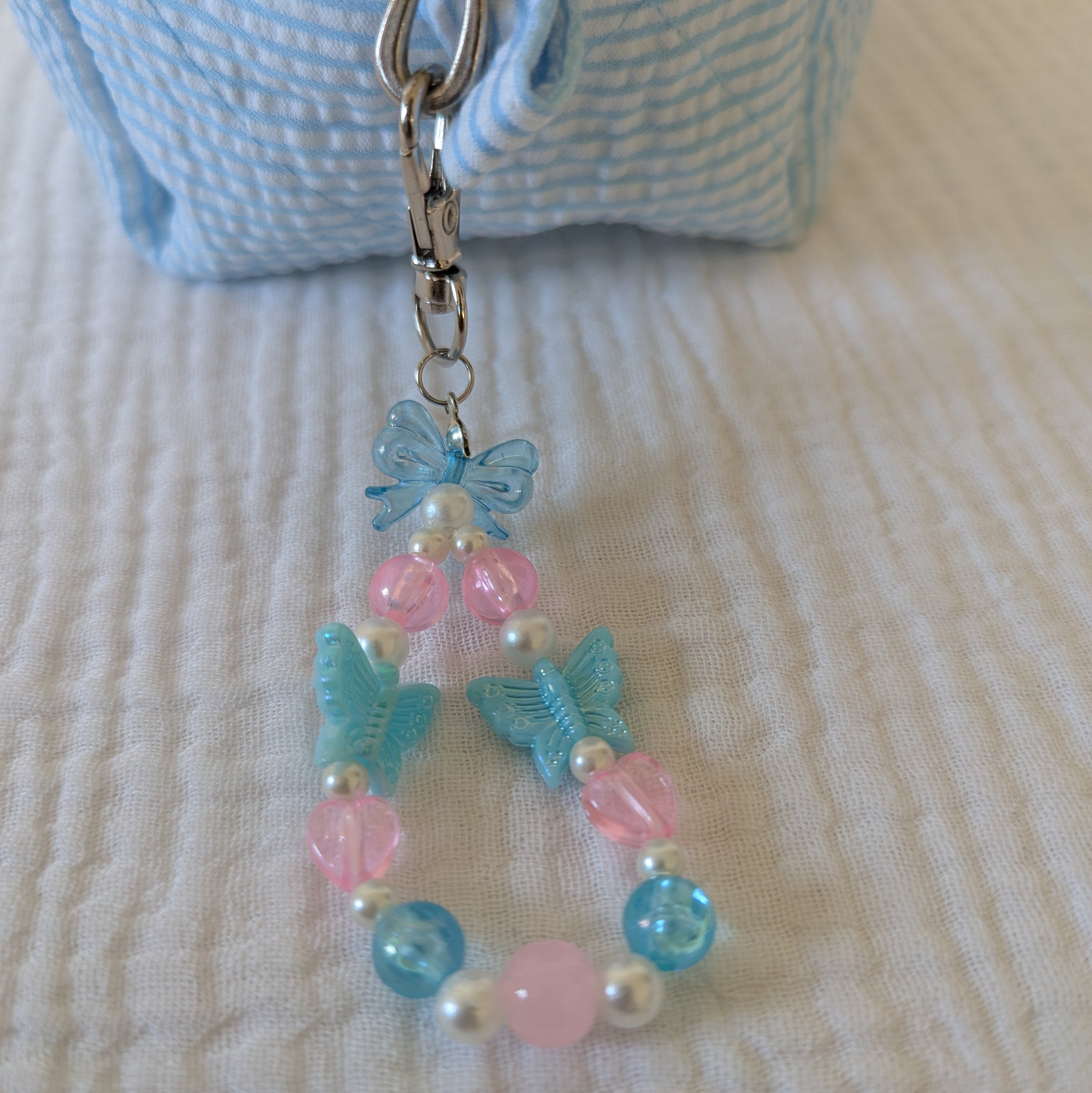 Bowtiful Handbestickte Kosmetiktasche